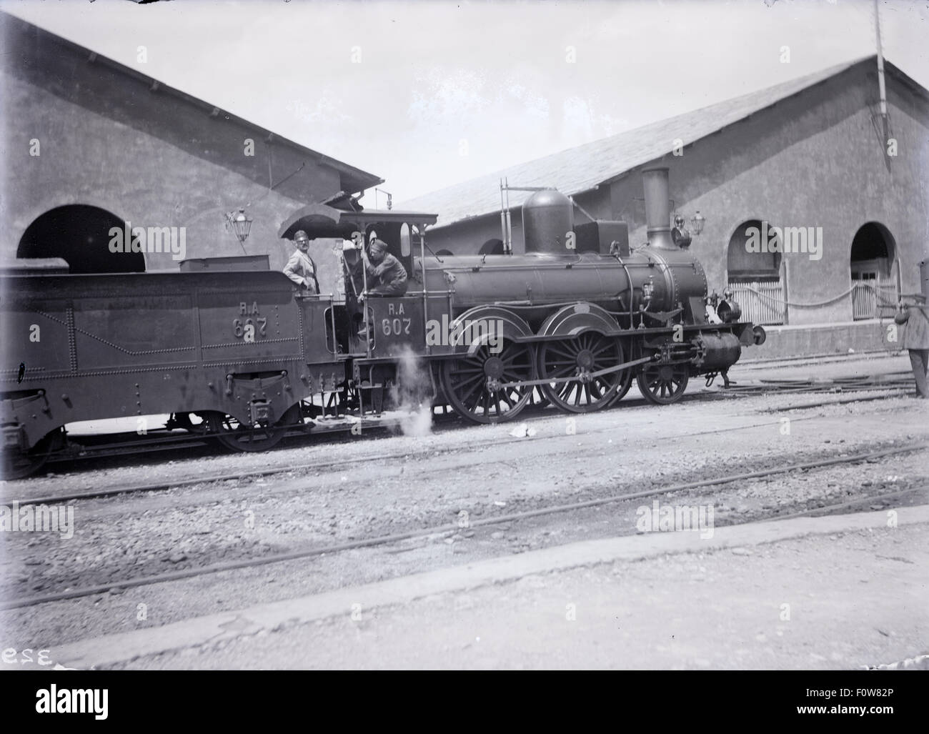 Antique c1910 photograph of a 2-4-0T tank locomotive, designated RA607 possibly for Richmond & Alleghany Railroad, with water tank and sandbox. Location unknown, USA. Stock Photo