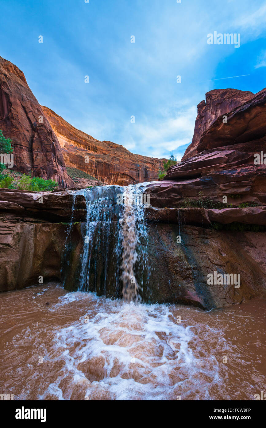 Stock Photo - Waterfall in Coyote Gulch part of Grand Staircase Escalante National Monument in southern Utah canyon country Stock Photo