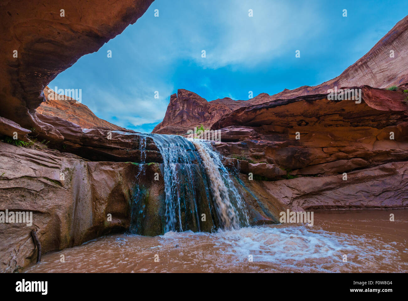 Stock Photo - Waterfall in Coyote Gulch part of Grand Staircase Escalante National Monument in southern Utah canyon country Stock Photo