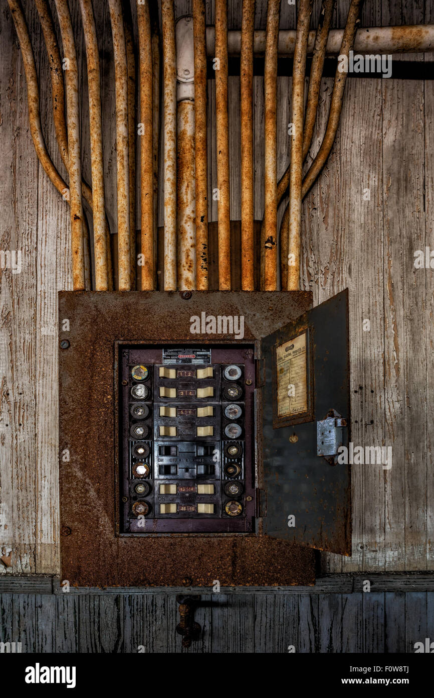 usted and abandoned Federal Electric panel board electrical breaker. Stock Photo