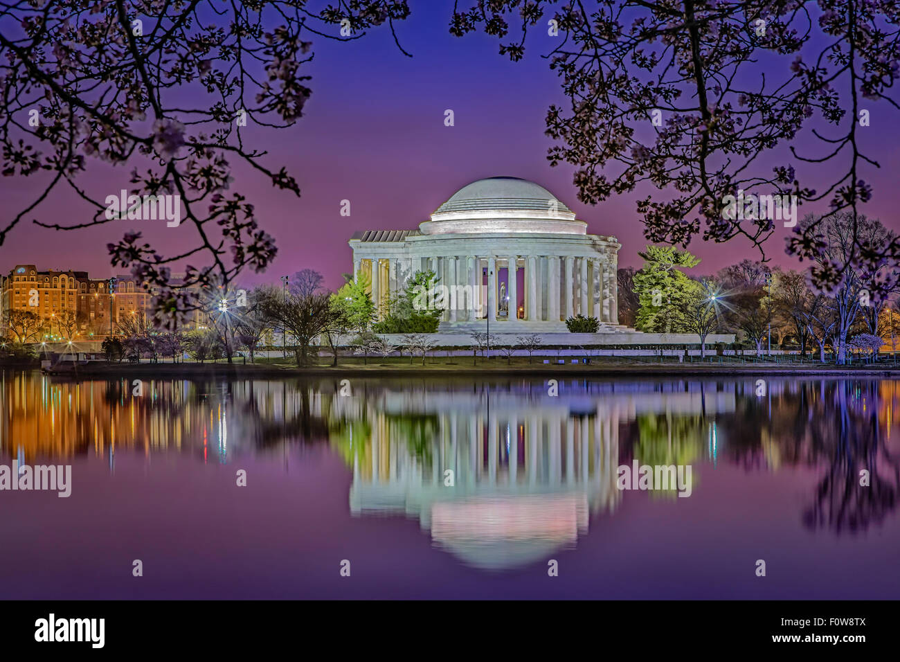 A view of the Thomas Jefferson Memorial from the Tidal Basin in Washington DC during the early morning twilight hour before sunrise. Stock Photo