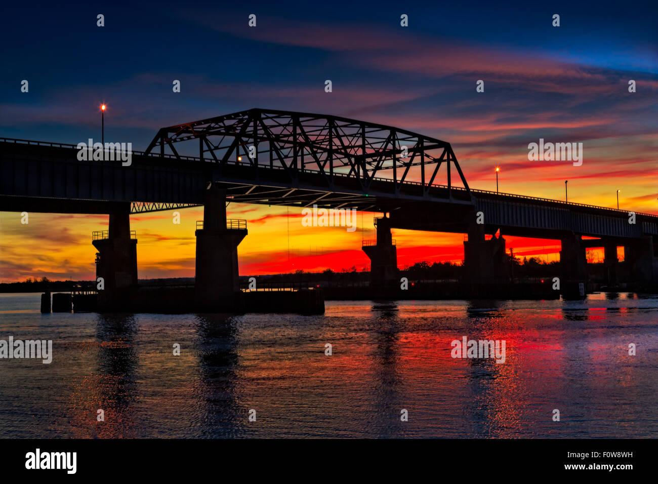 Silhouetted Route 3 bridge during sunset in Secaucus, Meadowlands area in New Jersey. Stock Photo