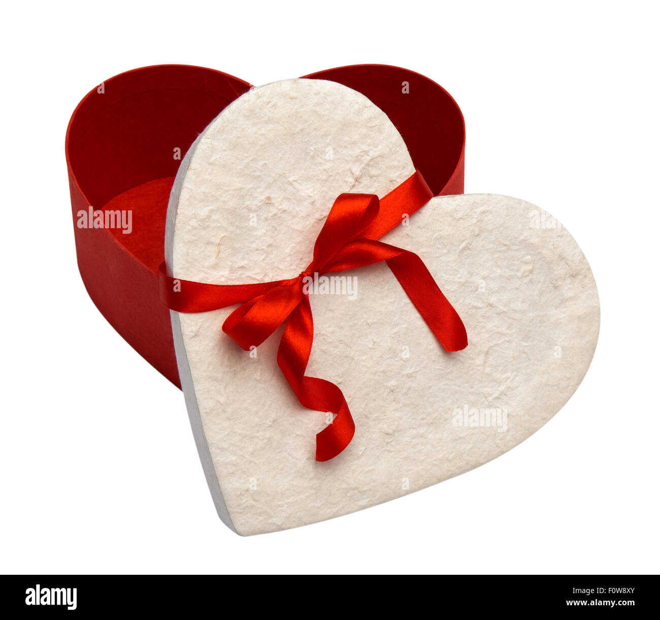 Gift box and red ribbon isolated on white background Stock Photo - Alamy