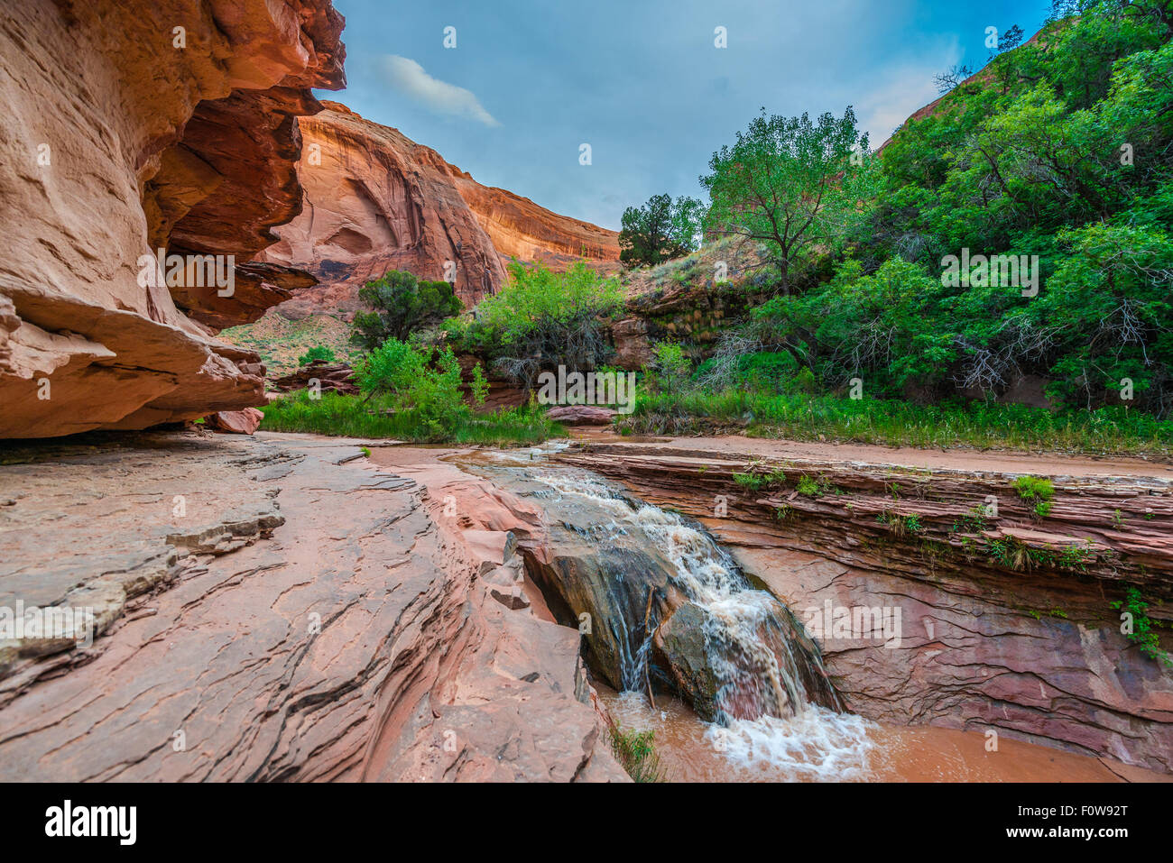 Stock Photo - Waterfall in Coyote Gulch part of Grand Staircase Escalante National Monument in southern Utah canyon country Stock Photo