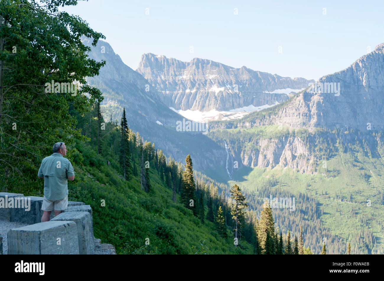 Tourist admiring Bird Woman Falls from a pullout on the Goingtothe