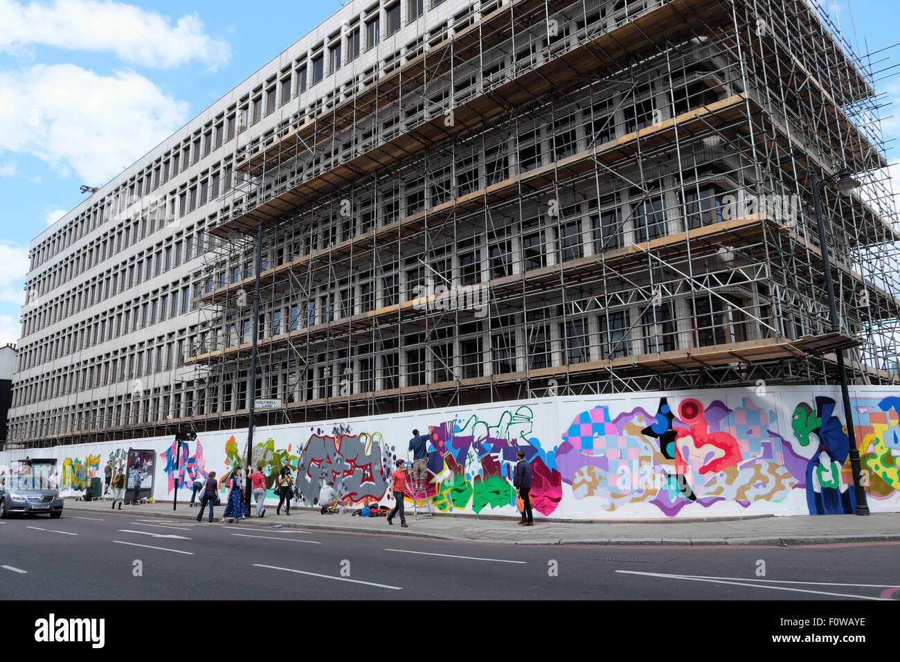 Graffiti wall on construction hoarding in Great Eastern Street East London, UK   KATHY DEWITT Stock Photo