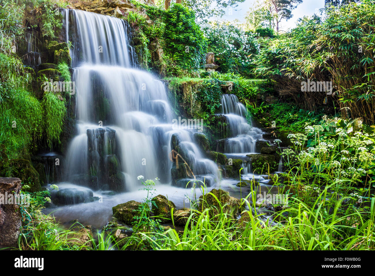 The waterfall known as the Cascade on the Bowood Estate in Wiltshire in summer. Stock Photo