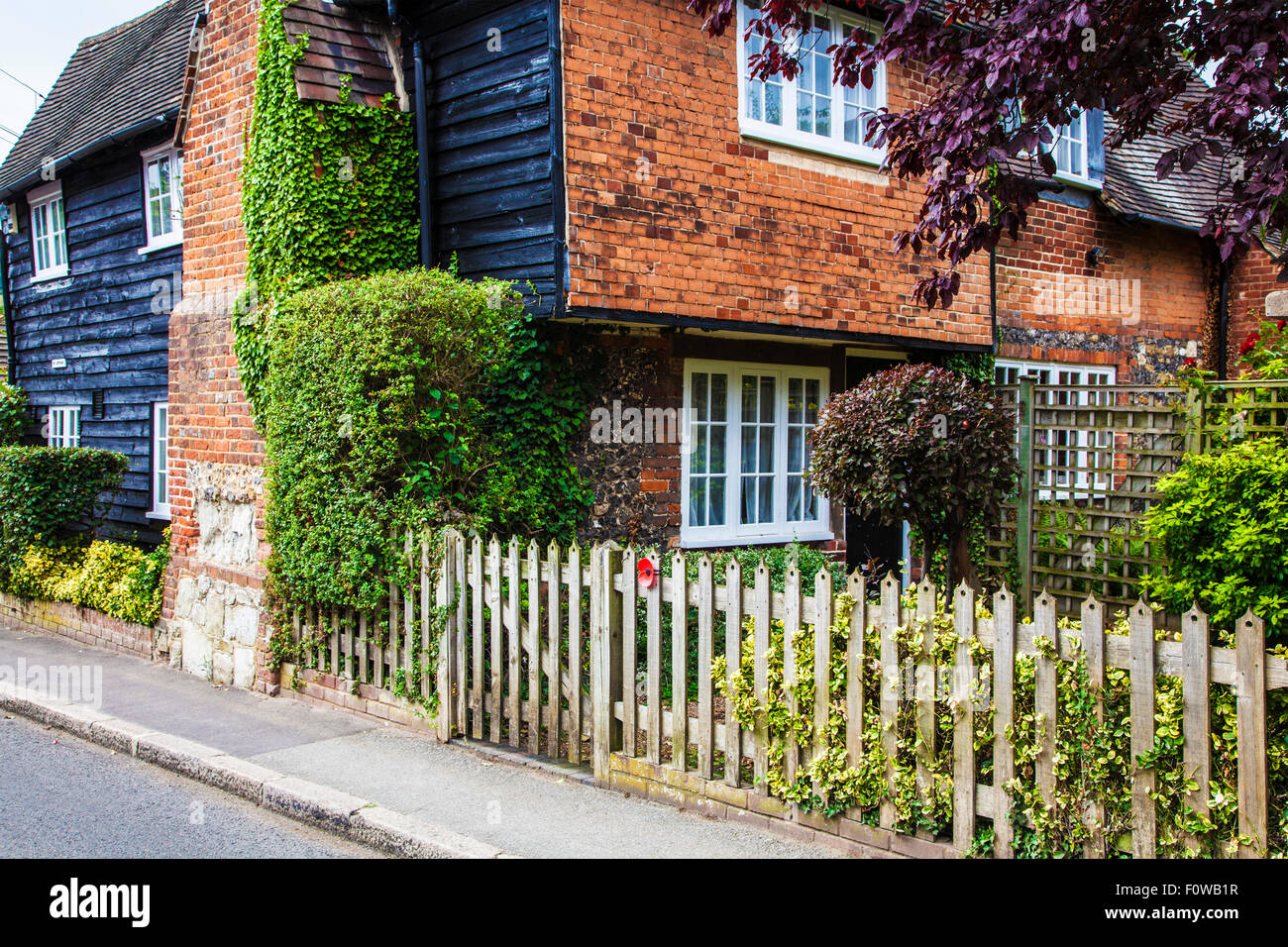 A pretty clapboard country cottage in the Kentish village of Shoreham