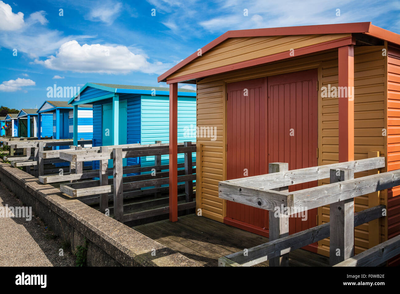 Colourful beach huts in the Kentish coastal resort of Whitstable. Stock Photo