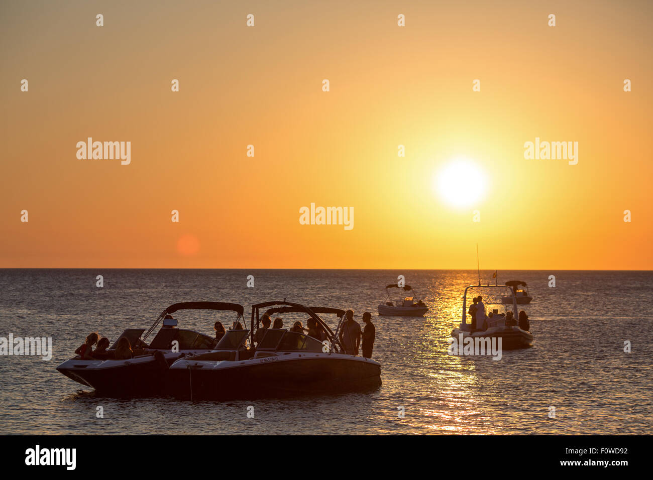 Ibiza, watching the sunset on sunset strip in San Antonio. Cafe Del Mar & Cafe Mambo Stock Photo