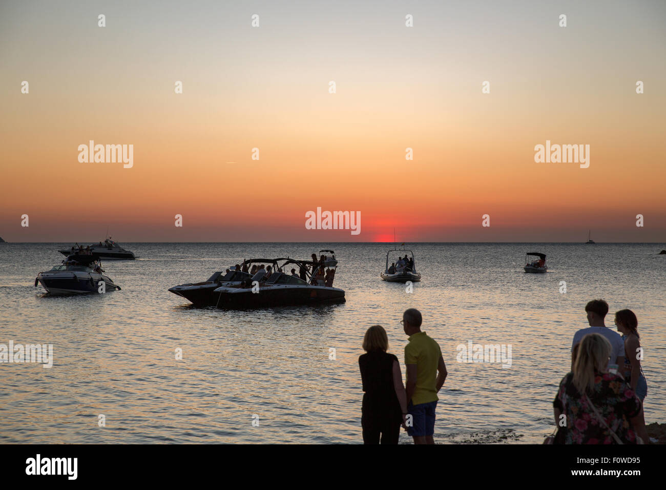 Ibiza, watching the sunset on sunset strip in San Antonio. Cafe Del Mar & Cafe Mambo Stock Photo