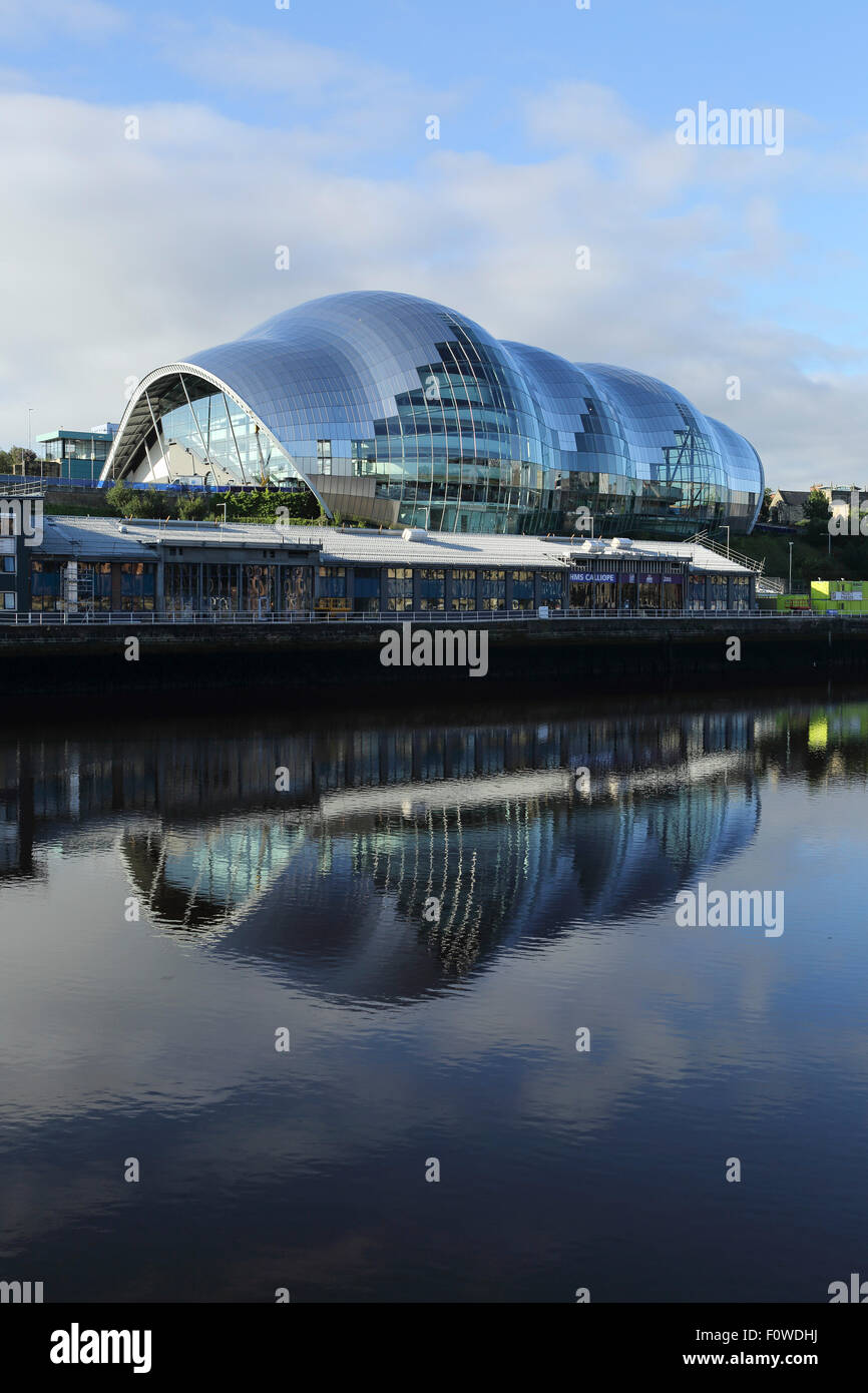 The Sage Gateshead reflects in the River Tyne at Gateshead, England. The performing arts centre opened in 2005. Stock Photo