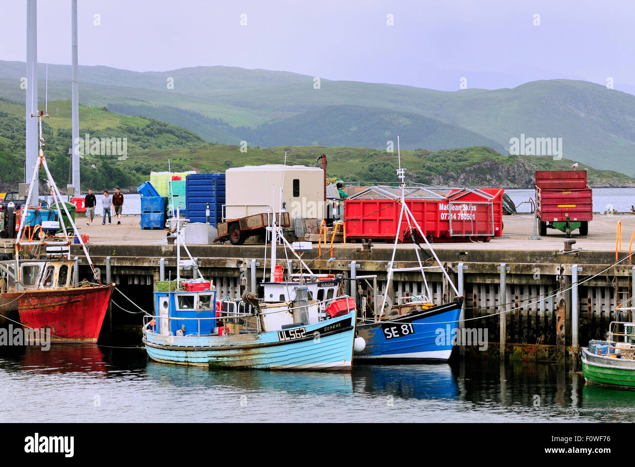 Fishing boats moored at a dock in Ullapool, Scotland Stock Photo - Alamy