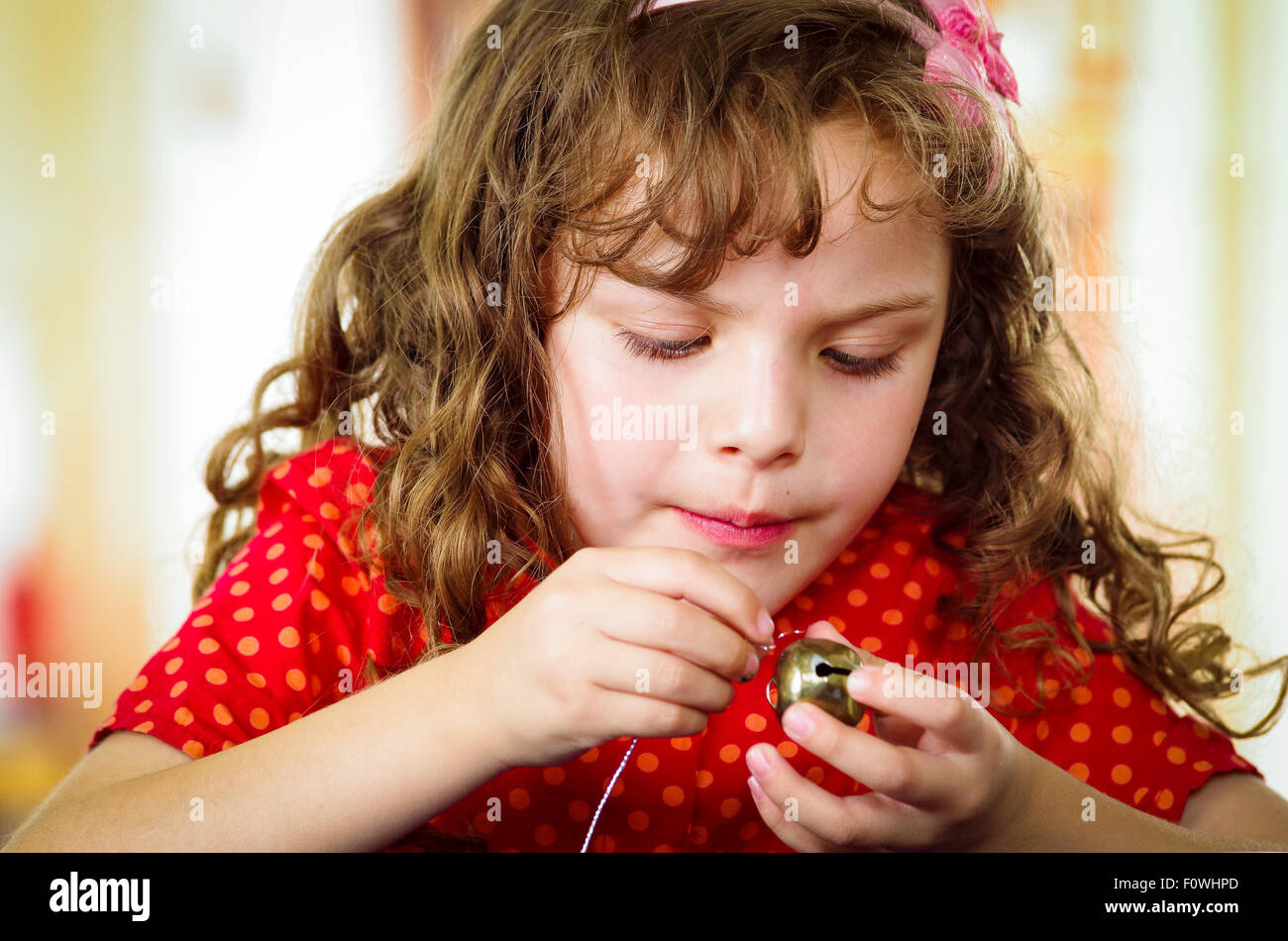 Adorable little girl making crafts Stock Photo