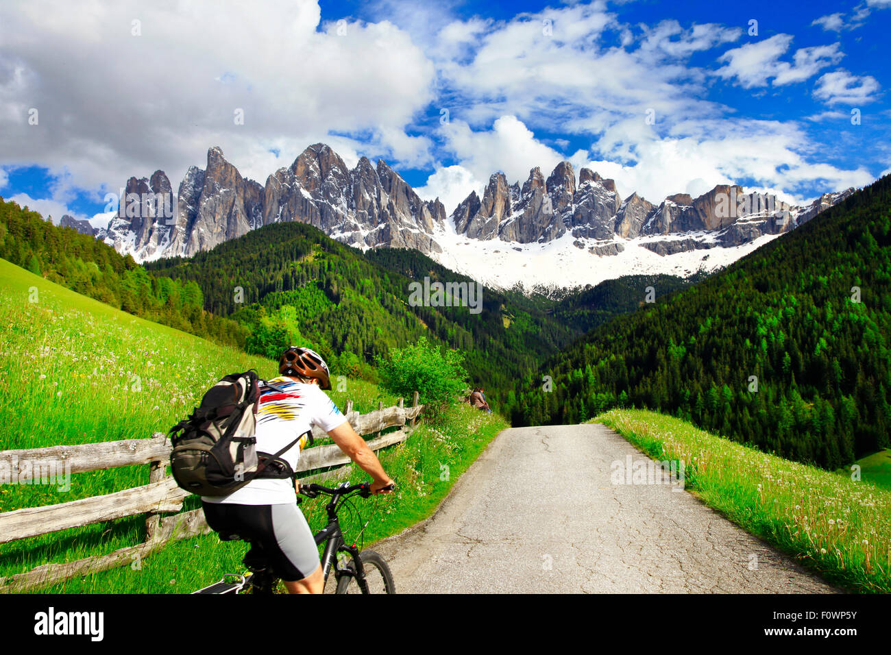 Cycling in Dolomites mountains. North of Italy. Stock Photo