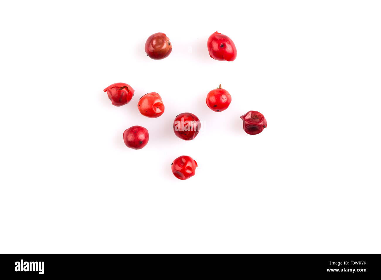 red peppercorns seeds isolated on white background Stock Photo Alamy