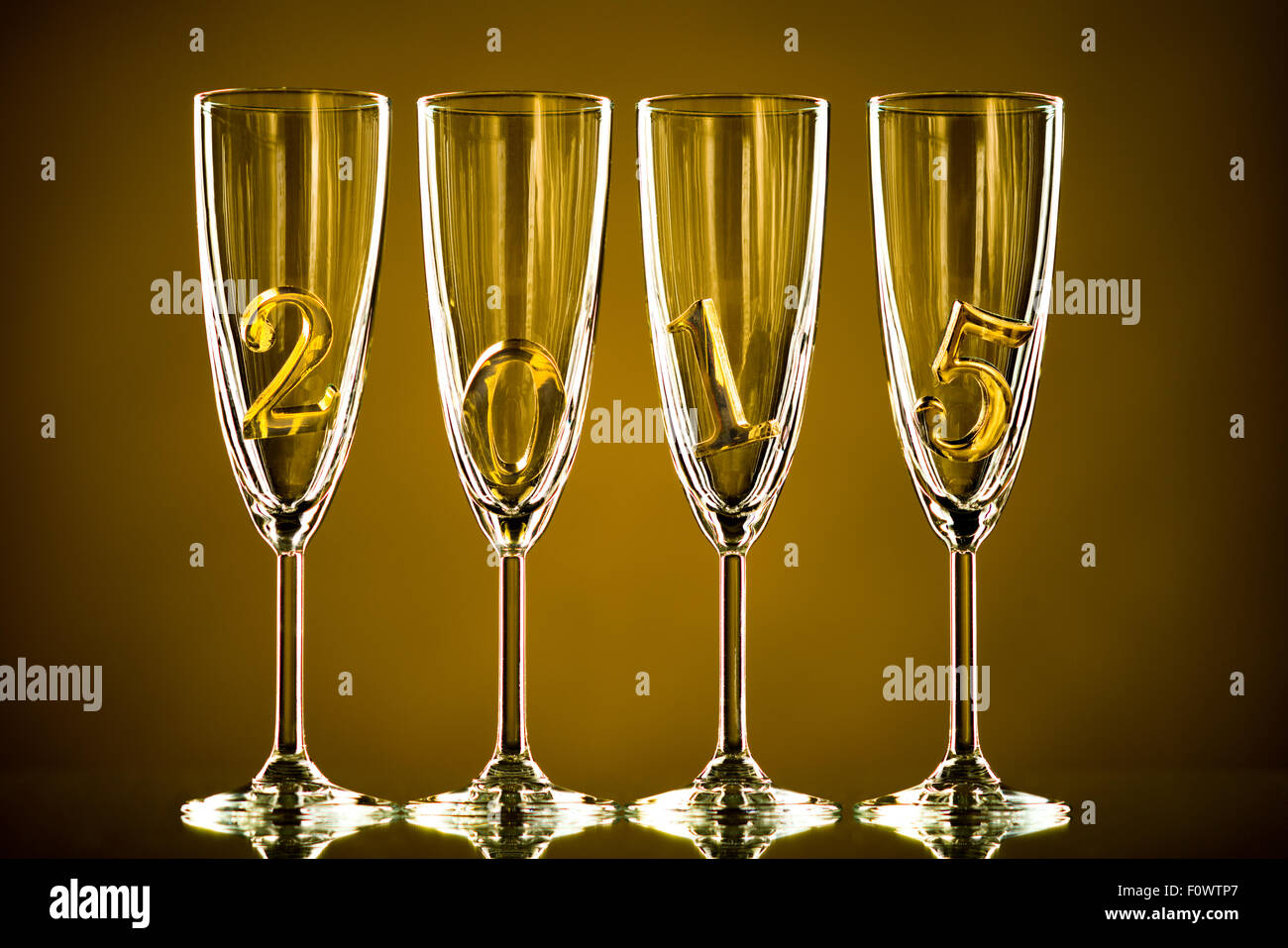 four glass goblet for champagne with  numeral 2015,  beautiful celebrations  New Year concept photo Stock Photo