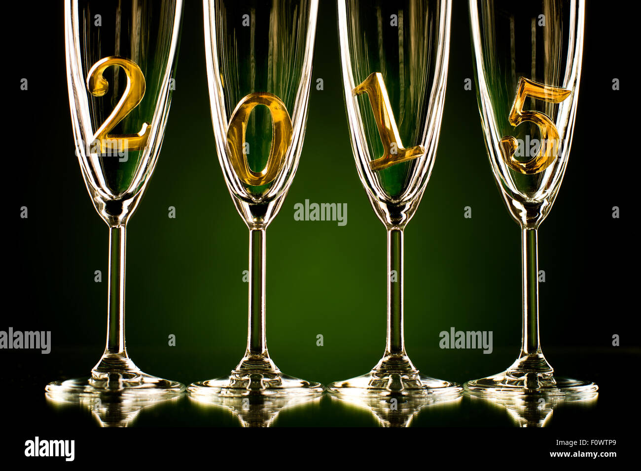 four glass goblet for champagne with  numeral 2015,  beautiful celebrations  New Year concept photo Stock Photo