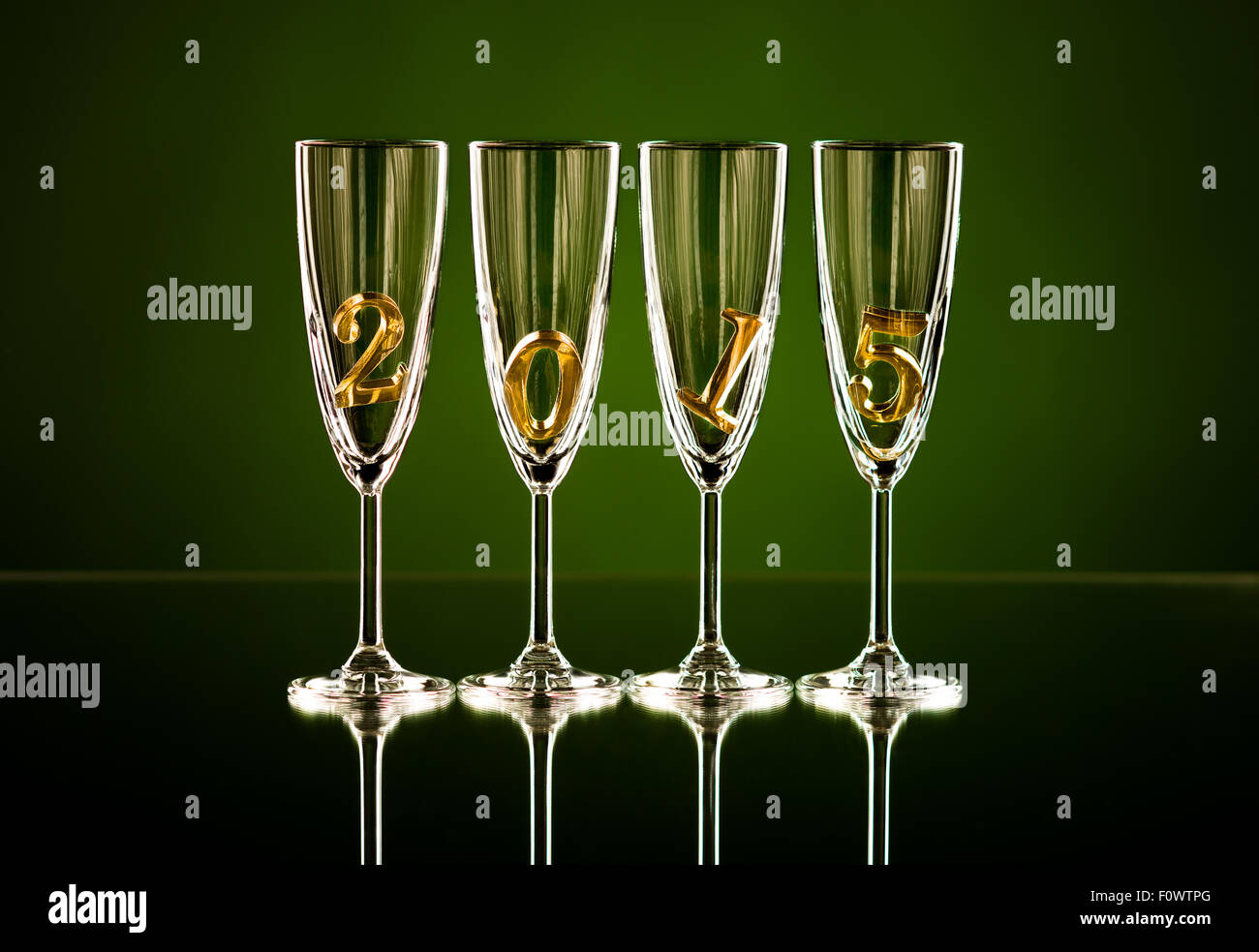 four glass goblet for champagne with  numeral 2015,  beautiful celebrations  New Year concept photo Stock Photo