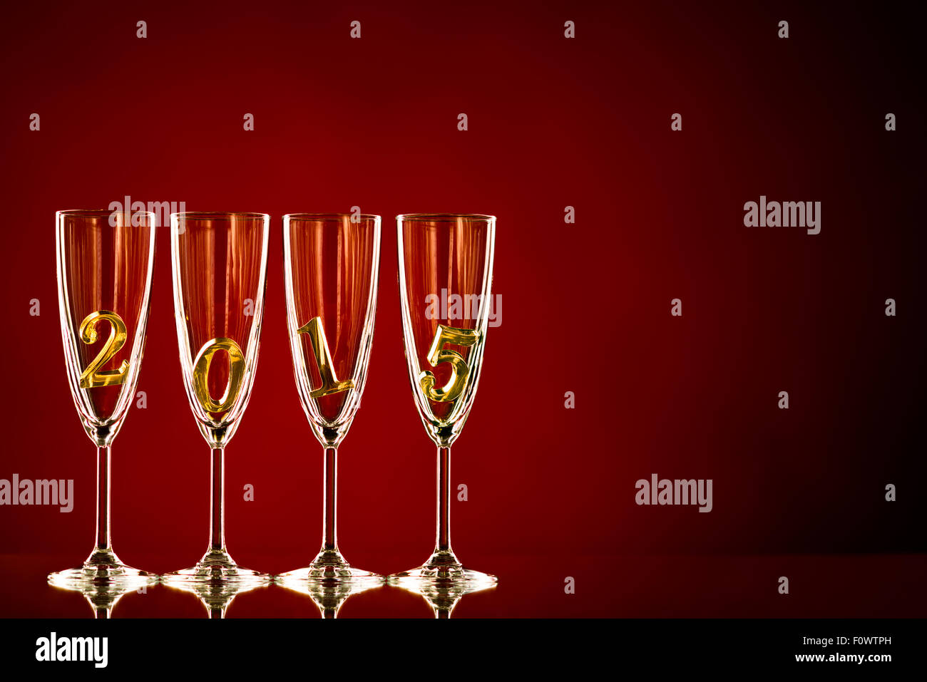 four glass goblet with champagne and  numeral 2015,  beautiful celebrations  New Year concept photo Stock Photo