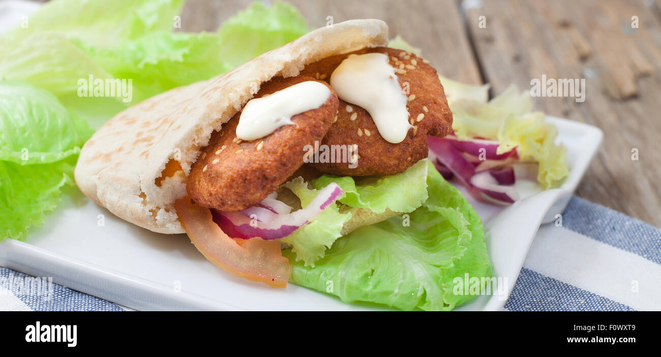 pita bread with lebanese falafel and salad with sauce Stock Photo - Alamy