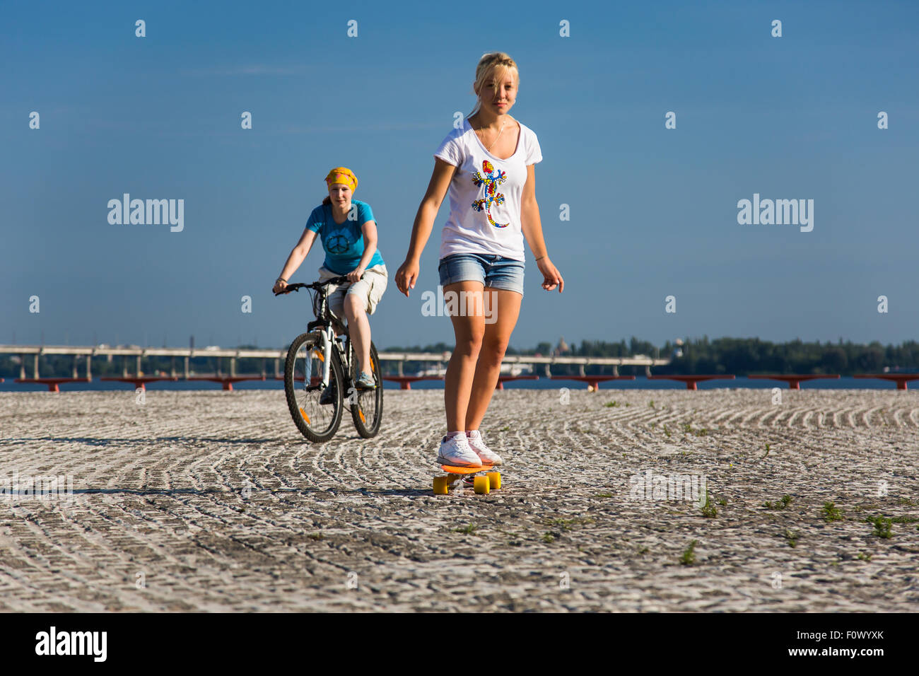 Mother and daughter do morning outdoor fitness Stock Photo