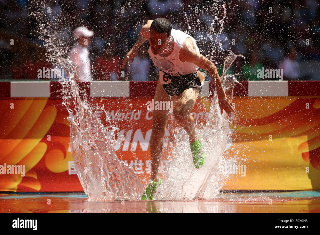 Beijing, China. 22nd Aug, 2015. Hicham Bouchicha of Algeria competes in the Men's 3000 m Steeplechase Heats during the 15th International Association of Athletics Federations (IAAF) Athletics World Championships at the National stadium, known as Bird's Nest, in Beijing, China, 22 August 2015. Photo: Christian Charisius/dpa/Alamy Live News Stock Photo