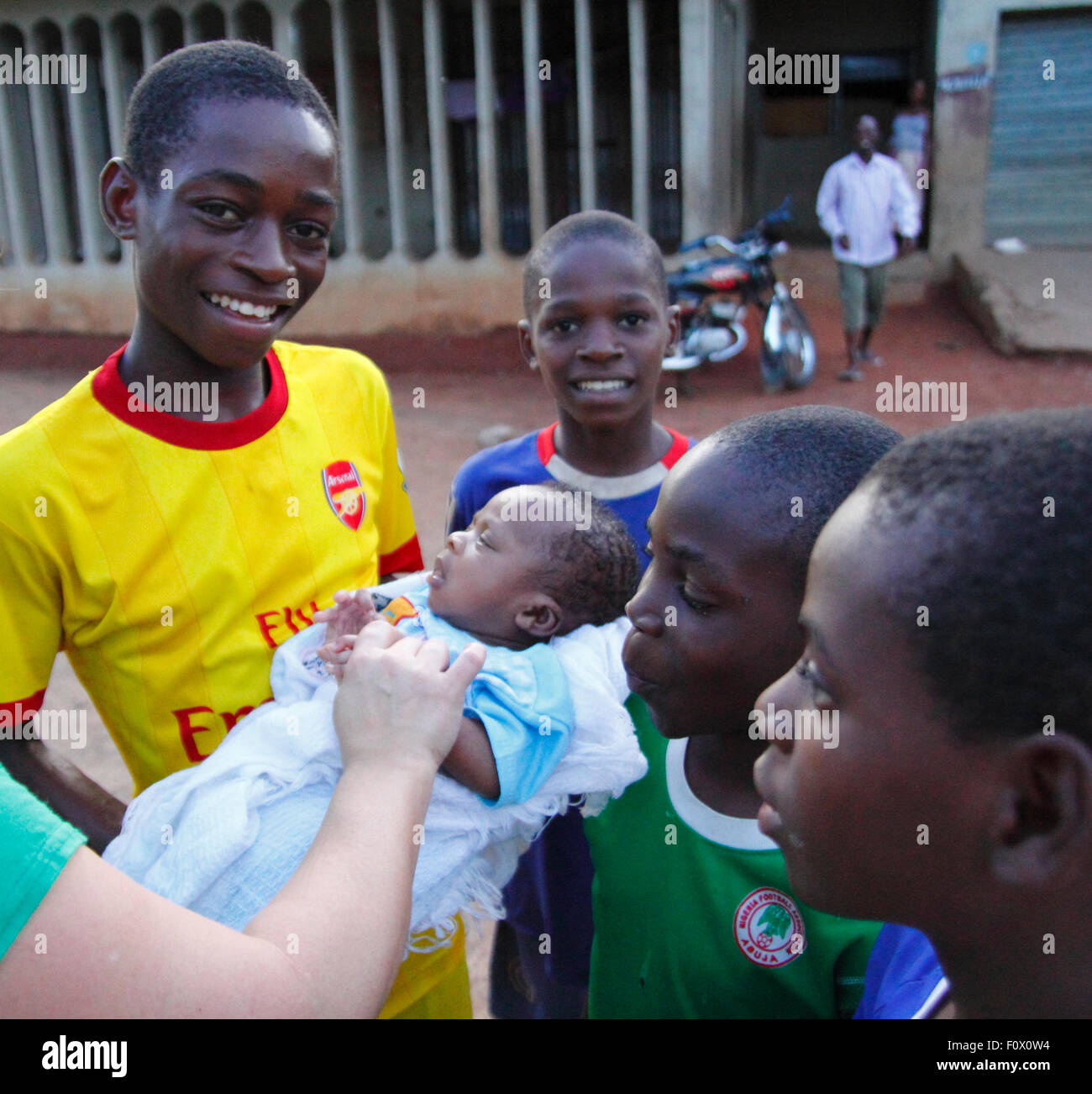 Nigerian boy with a baby stand up for a portrait i in Nigeria Stock Photo Alamy