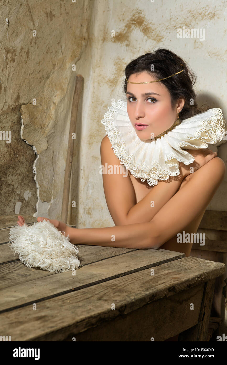 Fine art renaissance portrait of a naked woman wearing a lace collar in the  style of the old masters Stock Photo - Alamy