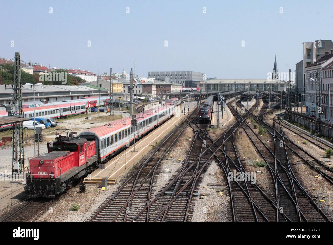 Railway track with trains at the entrance to Westbahnhof railway