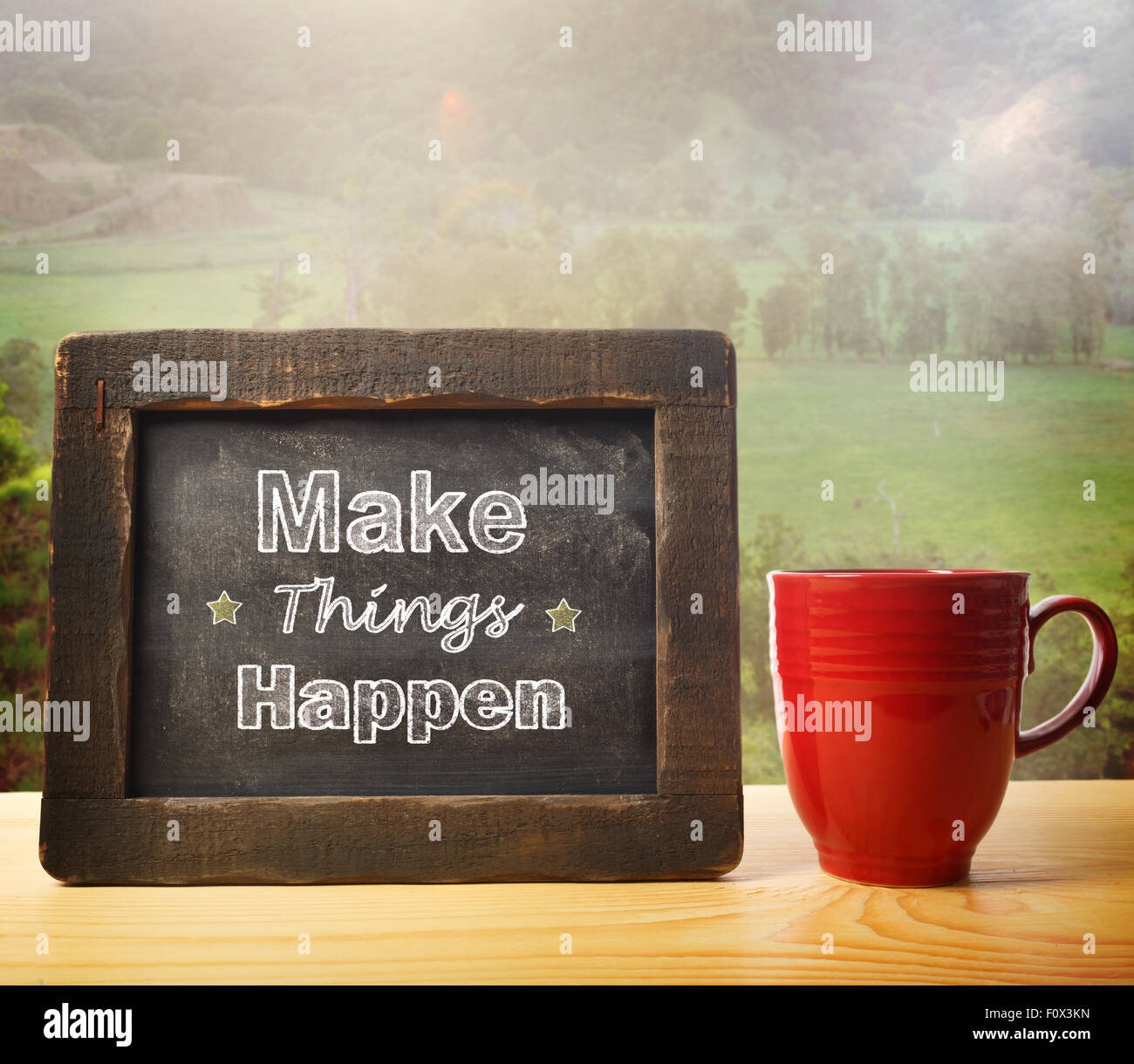 Make Things happen inscribed on blackboard rustic style Stock Photo