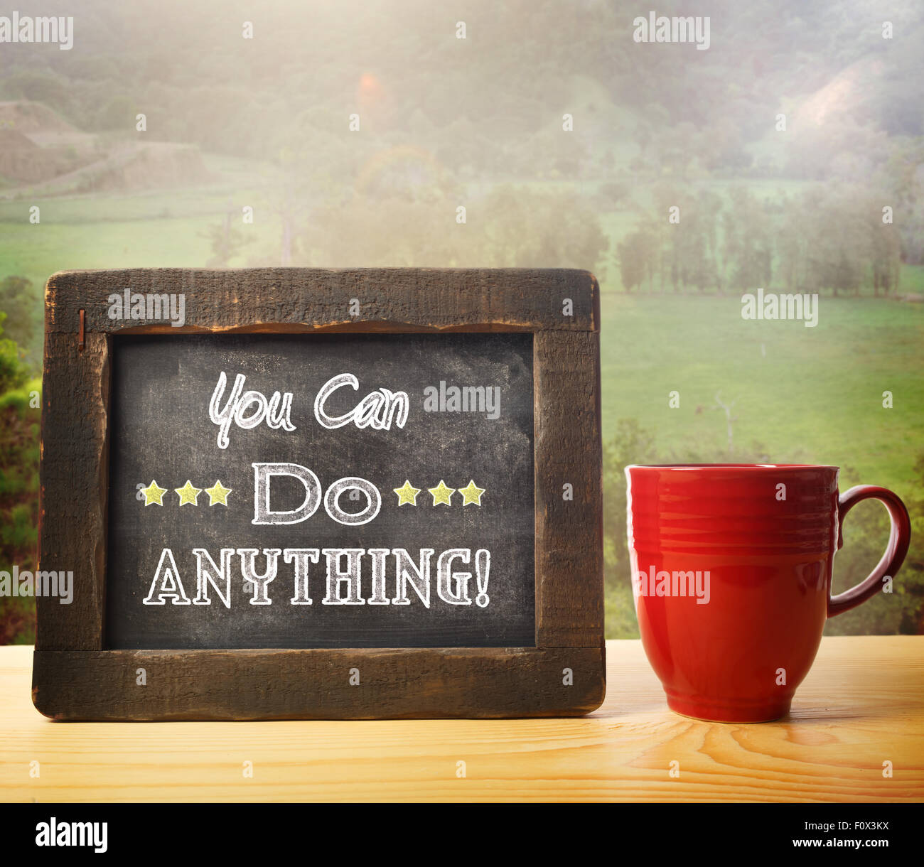 You Can Do Anything inscribed on blackboard rustic style Stock Photo