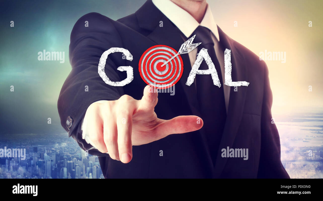 Business man pointing to the target, reaching the goal Stock Photo