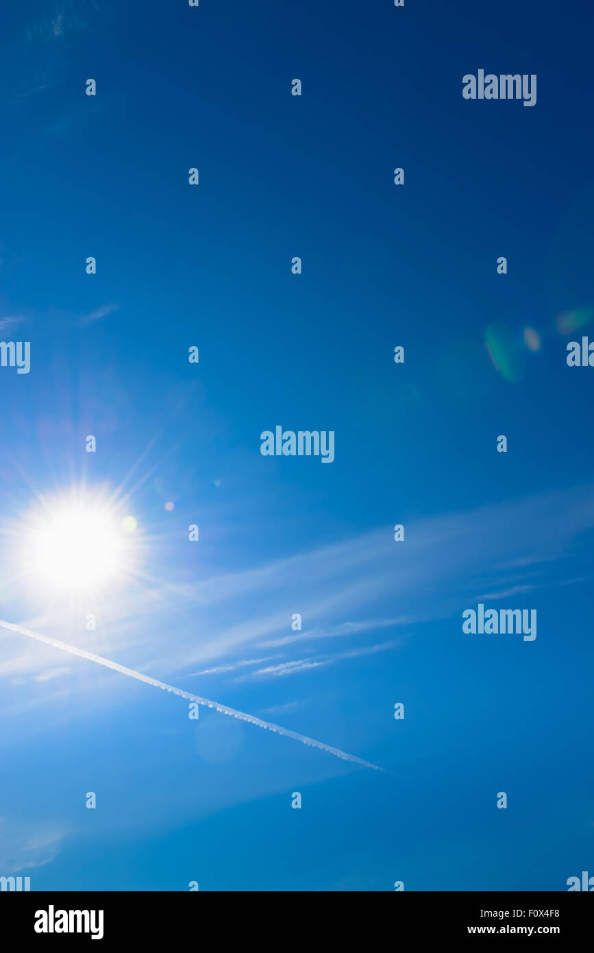 Sun and sky with lens flare background Stock Photo