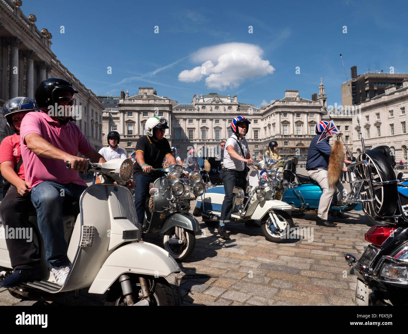 London, UK. 22nd August, 2015. Scooter posse visit to Somerset House at the Strand London to visit The Jam Exhinition 'About the Young Idea'. Credit:  Martyn Goddard/Alamy Live News Stock Photo