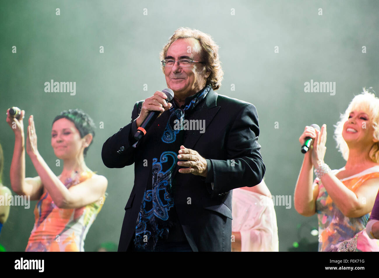 Berlin, Germany. 21st Aug, 2015. Albano Carrisi (Al Bano) performs on stage during a concert in Berlin, Germany, 21 August 2015. The concert of the singing duo Al Bano and Romina Power was their first in the German-speaking region in 20 years. Photo: Gregor Fischer/dpa/Alamy Live News Stock Photo