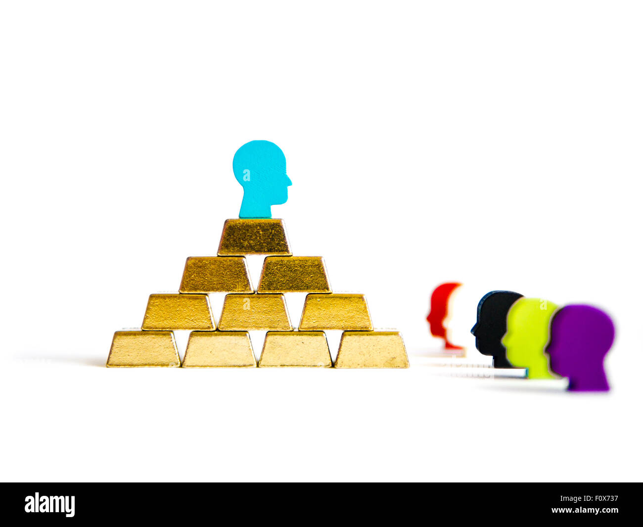 Golden bricks: wealth inequality conceptualization isolated Stock Photo
