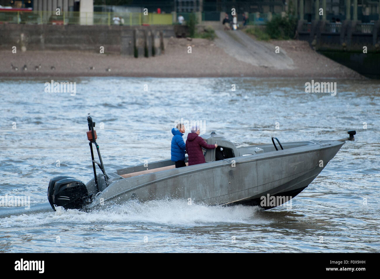 A military style boat in front of the MI6 building during filming of ...