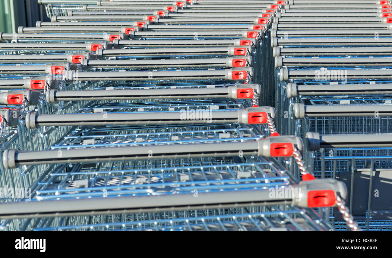 Trolleys outside Aldi store, UK Stock Photo Alamy