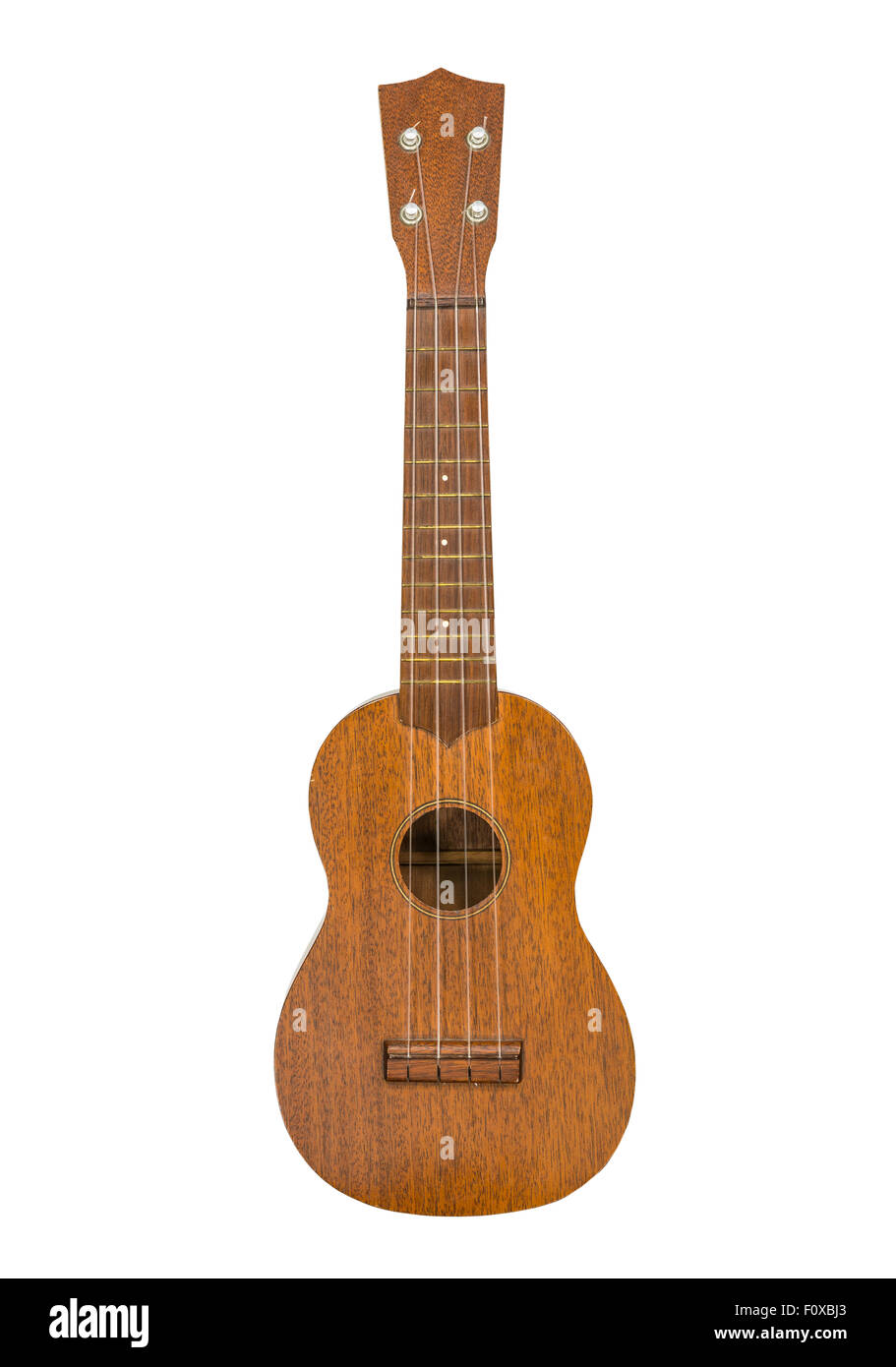 Toy ukulele guitar isolated with clipping path. Stock Photo