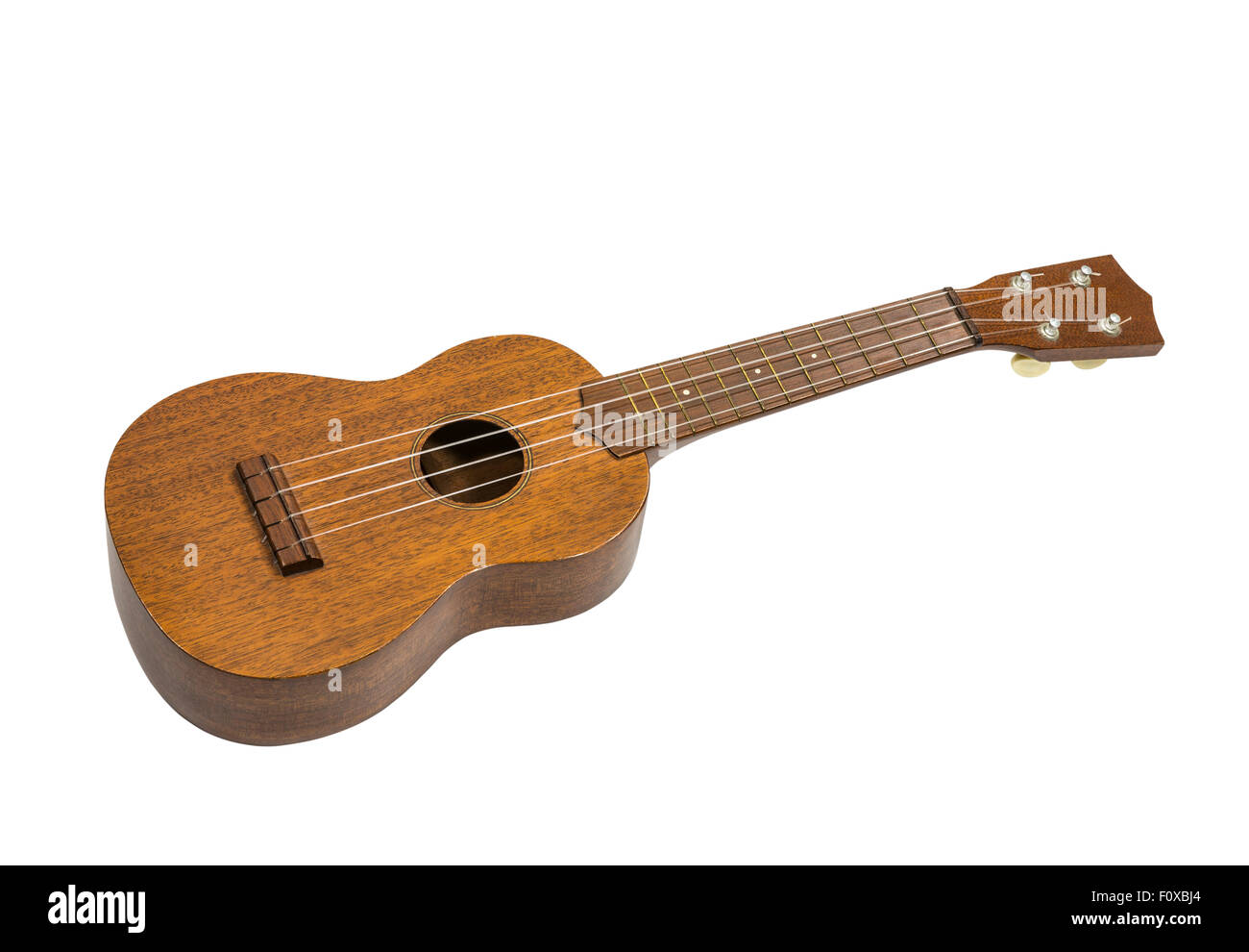 Toy guitar ukulele isolated with clipping path. Stock Photo