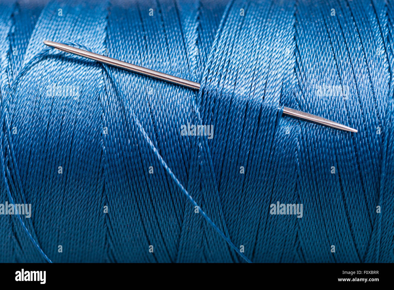 Blue thread hi-res stock photography and images - Alamy