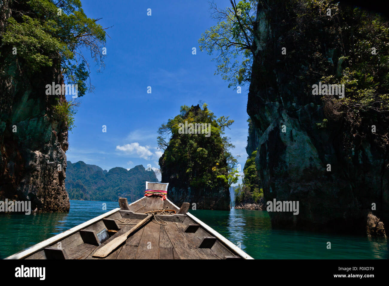 KARST FORMATIONS covered with tropical jungle at CHEOW EN LAKE in the KHAO SOK NATIONAL PARK - THAILAND Stock Photo
