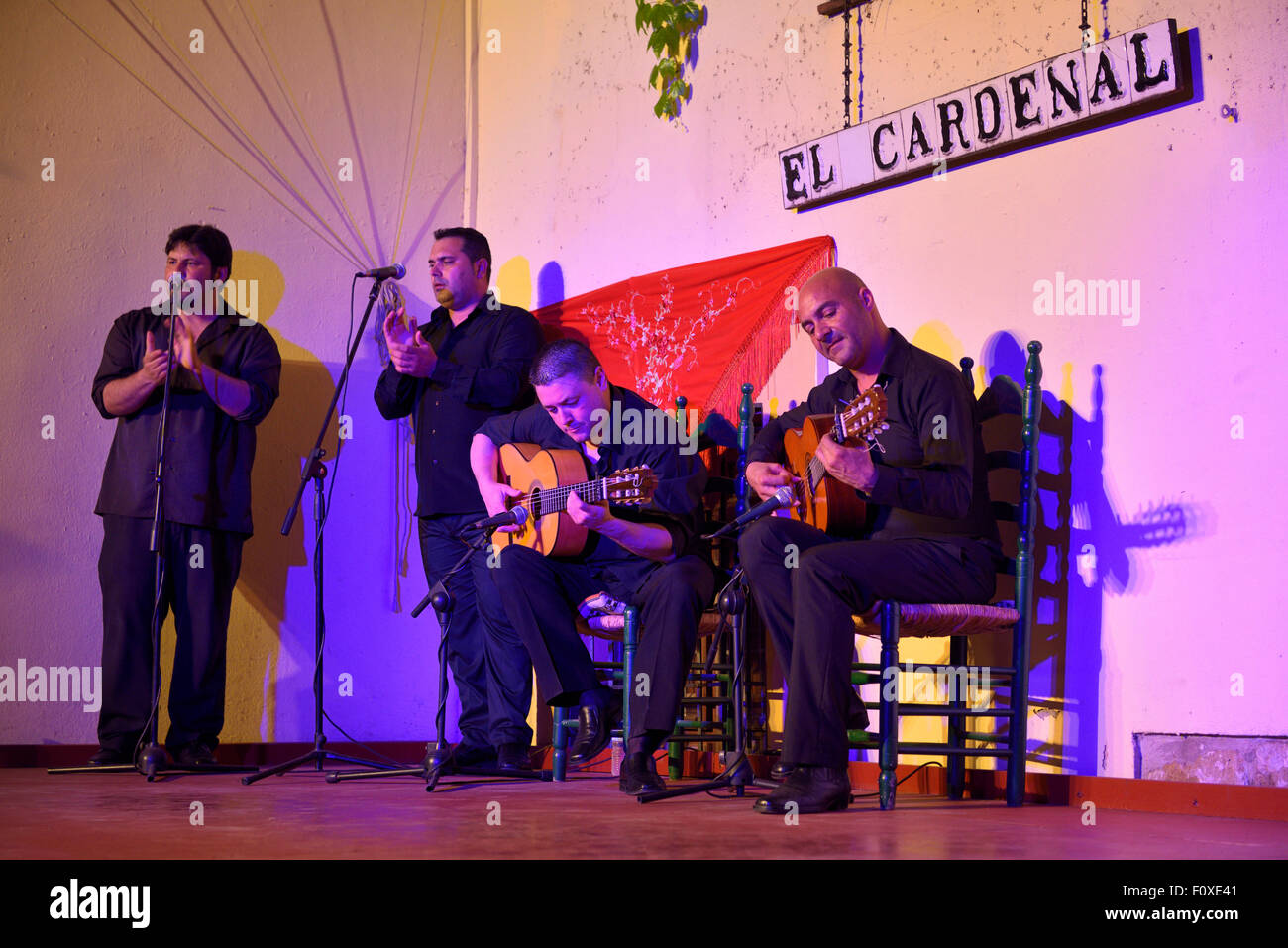 Two Flamenco singers, guitarists at an outdoor patio Tablaos stage in Cordoba Spain Stock Photo