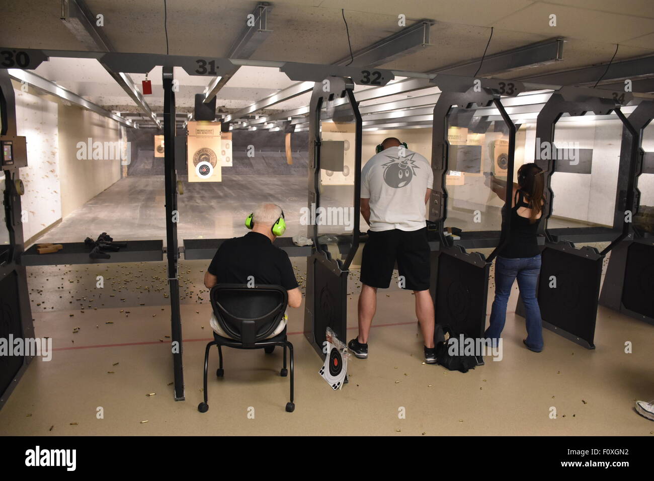 Denver, Colorado, USA. 15th July, 2015. Members of the Centennial Gun Club practise at a