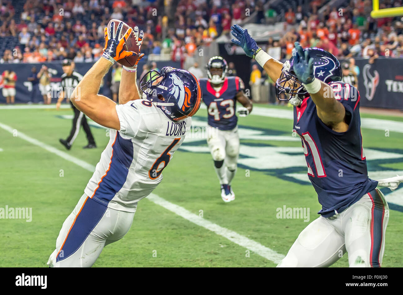 Houston, TX, USA. 22nd Aug, 2015. Denver Broncos wide receiver Corbin Louks (6) receives the ball for a touchdown during the NFL preseason football game between the Denver Broncos and the Houston Texans at NRG Stadium in Houston, TX. Rudy Hardy/CSM/Alamy Live News Stock Photo