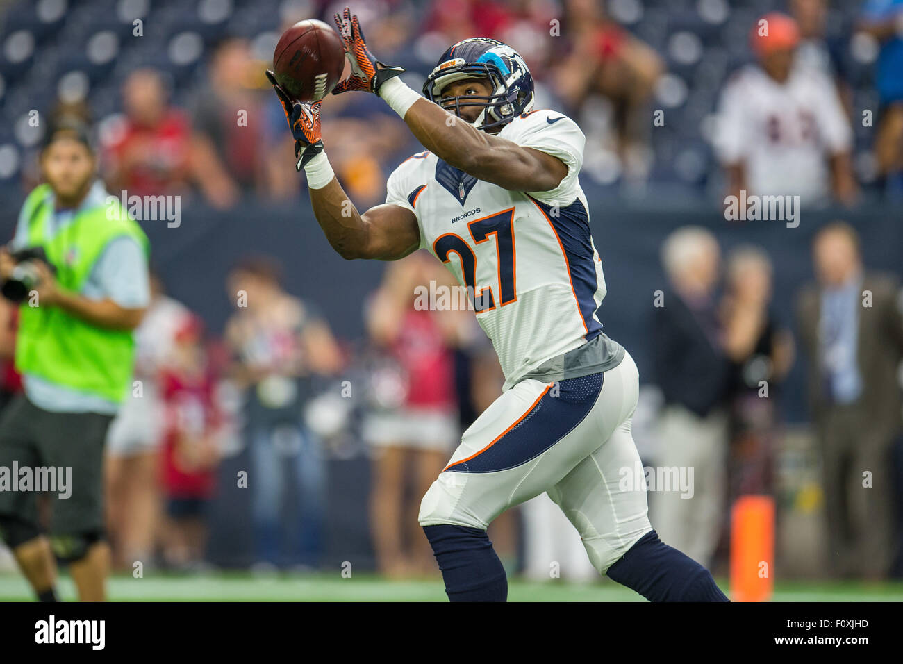 Houston, Texas, USA. 22nd Aug, 2015. Denver Broncos running back Jeremy Stewart (27) warms up prior to an NFL preseason game between the Houston Texans and the Denver Broncos at NRG Stadium in Houston, TX on August 22nd, 2015. Credit:  Trask Smith/ZUMA Wire/Alamy Live News Stock Photo