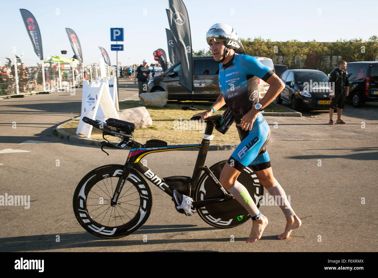 Exhausted female triathlete hi-res stock photography and images - Alamy