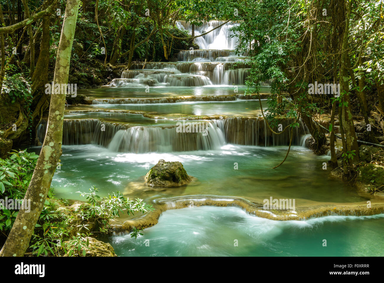 Deep forest waterfall kanchanaburi thailand hi-res stock photography ...