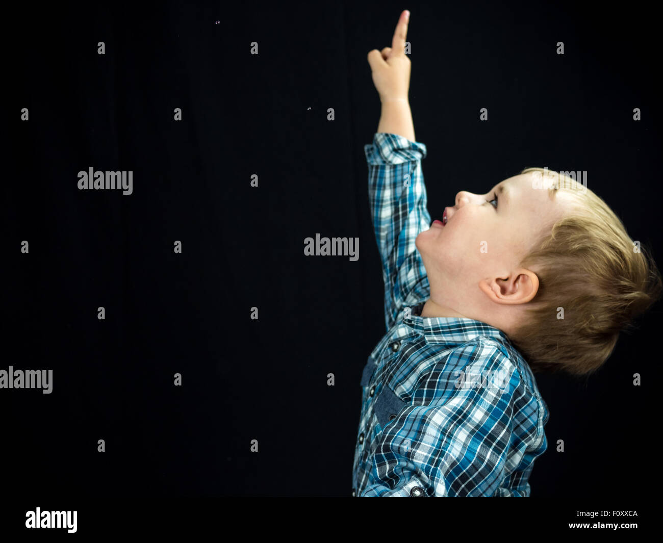 baby boy. Studio photo with black background Stock Photo Alamy